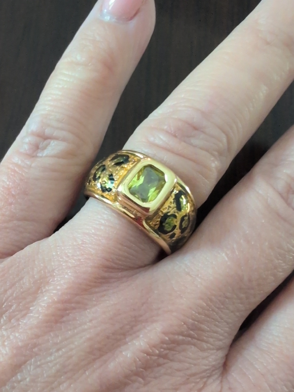 Gold-Tone Ring with Green Gemstone
